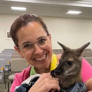 Picture of Carla holding a small animal